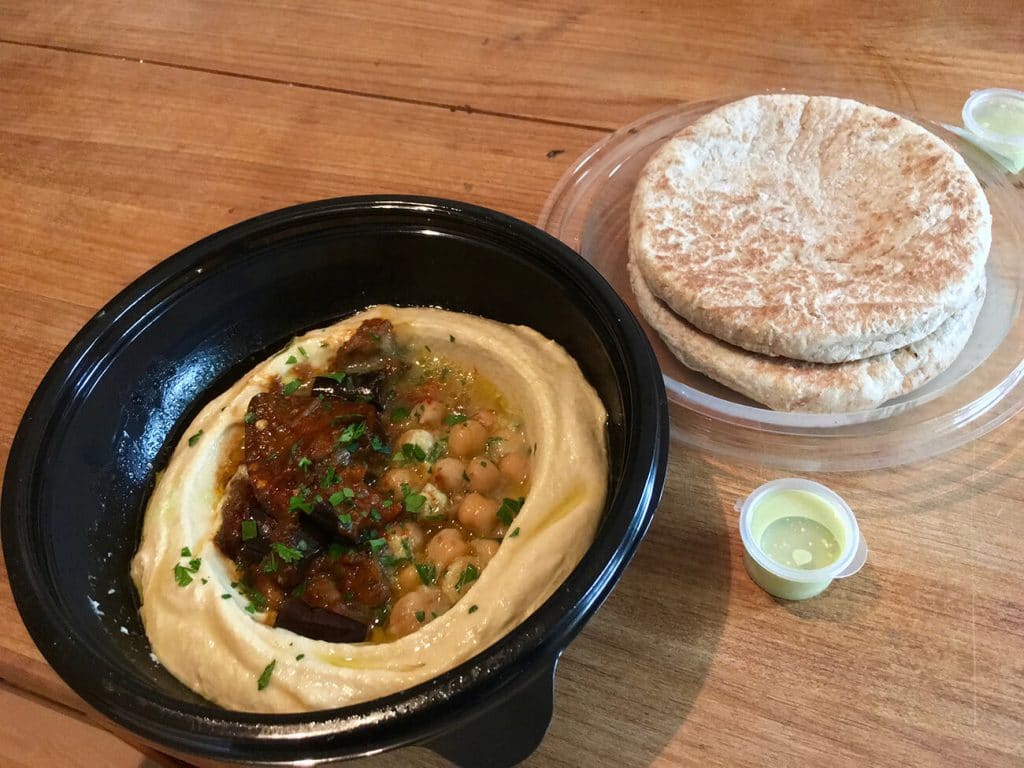 A delicious vegan meal with hummus in Amsterdam. Read this local's guide to the best vegan food in Amsterdam!
