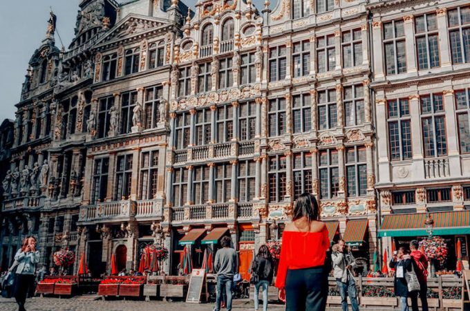 Girl walking around Grand Place in Brussels, Belgium