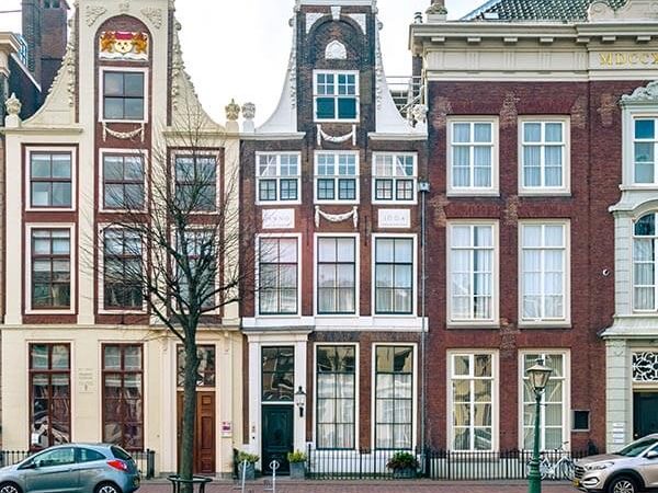 Beautiful canalhouses along a canal in Leiden, a city in Holland